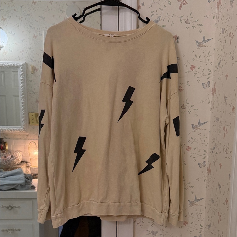 Beige Easel Sweatshirt with Black Lightning Bolts
